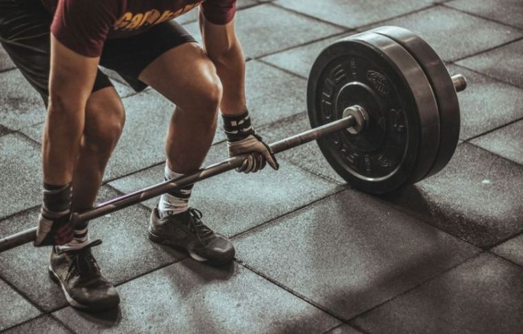 man performing deadlift