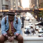 man relaxing in city