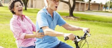 elderly couple on bike