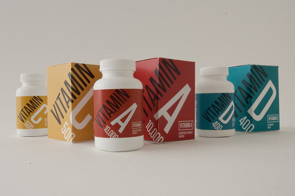 Vitamin supplement bottles and boxes